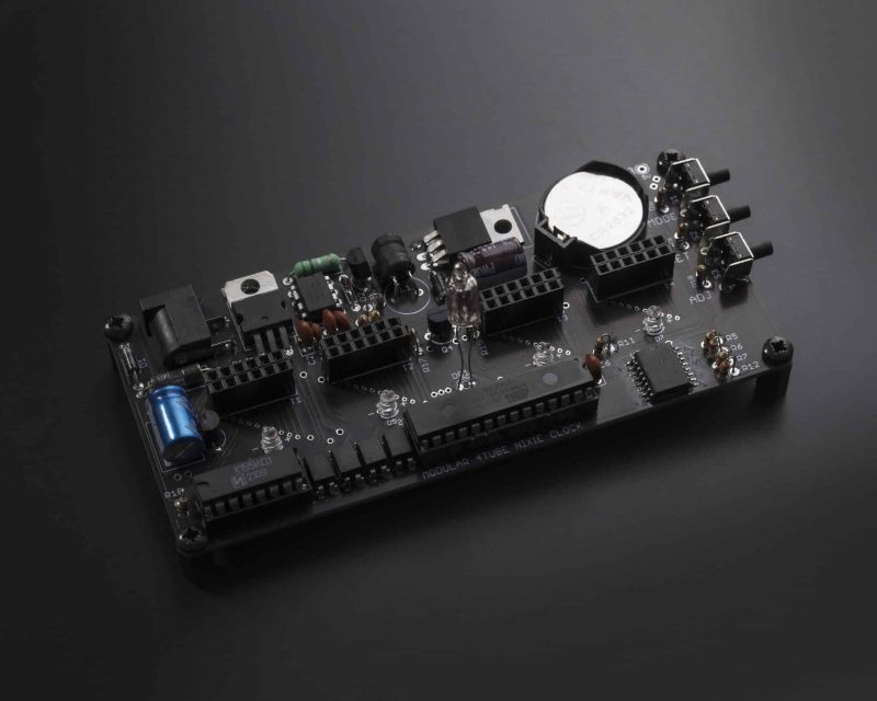 Modular Nixie clock controller board with four tube connectors, control buttons and backup battery.