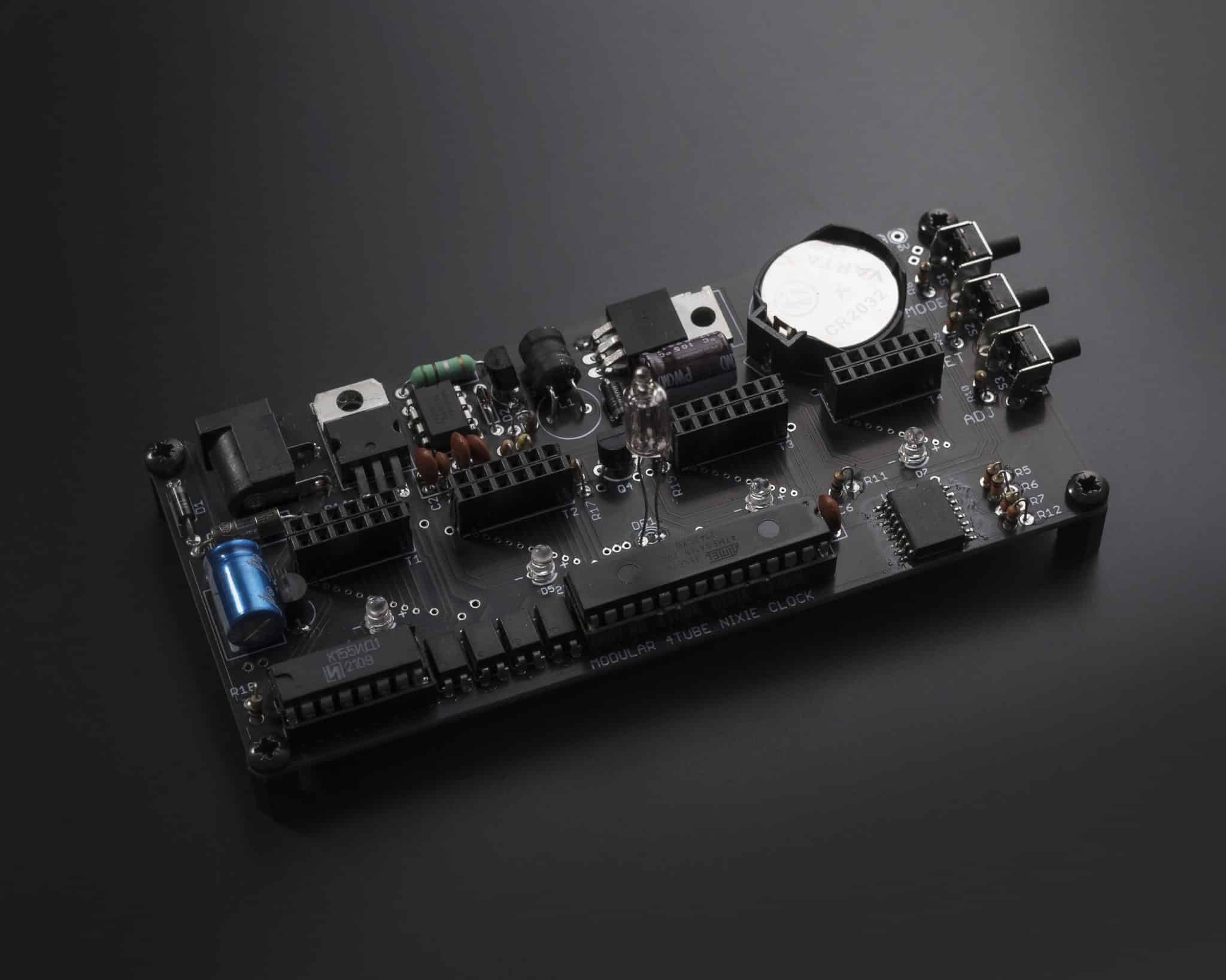 Modular Nixie clock controller board with four tube connectors, control buttons and backup battery.