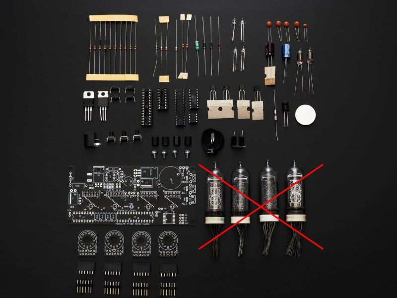 Electronic components and removable tube boards for the modular four-tube Nixie clock kit; tubes are not included.